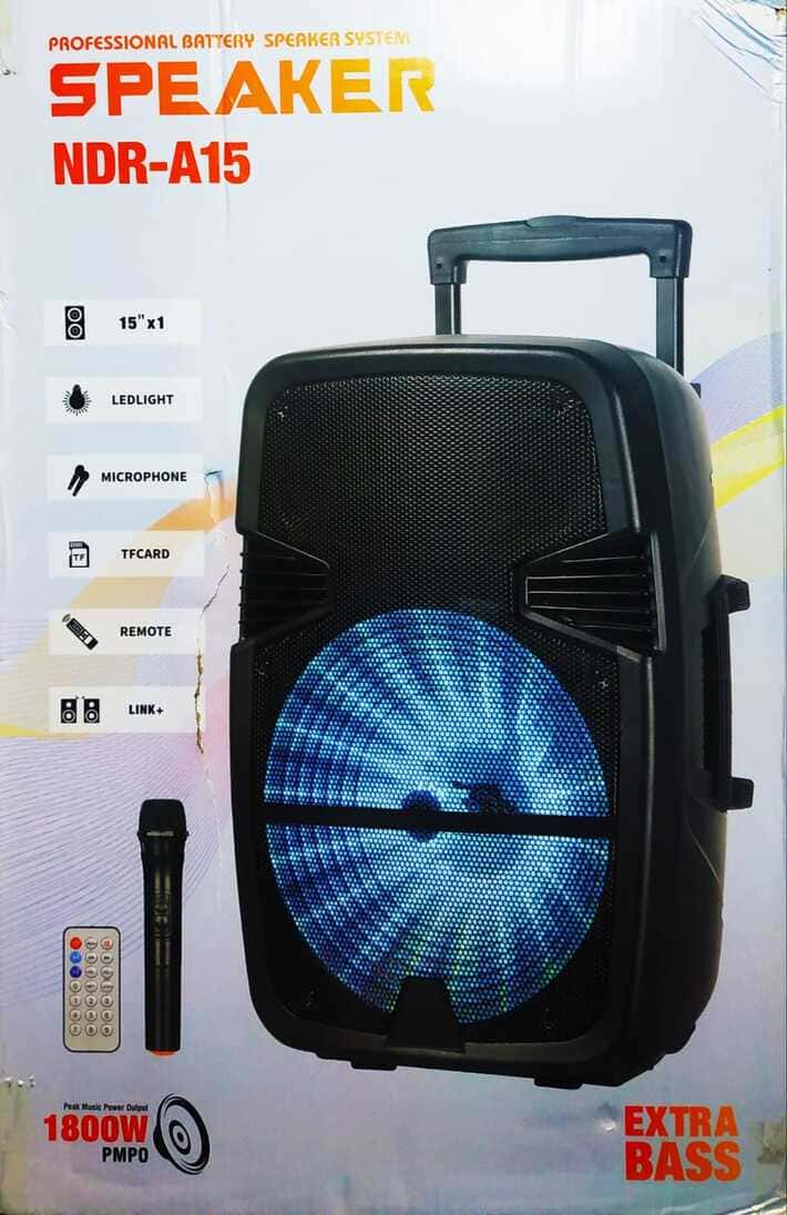 jKyhpcKZ59FJwAsK1LIVoZBVjTTvWmzSWYITEnC5 (1) (1) 15 Inch NDR-A15 1800 PMPO Professional Bluetooth Speaker System with Wireless Mic and Remote - Extra Bass Party Speaker - Image 1